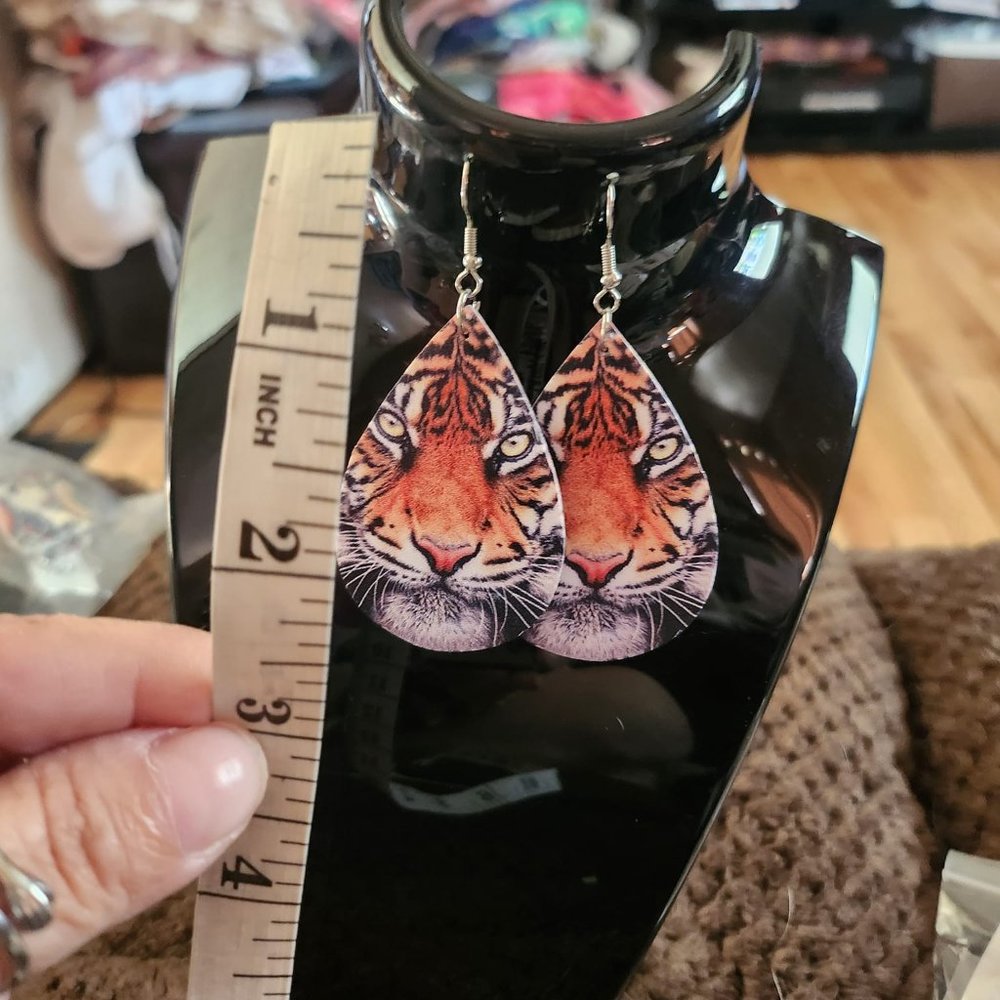 NEW FAUX LEATHER LION EARRINGS